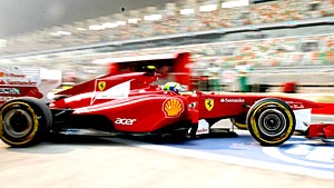Em dia marcado por poeira e cães na pista, Massa é o mais rápido na Índia (AP)