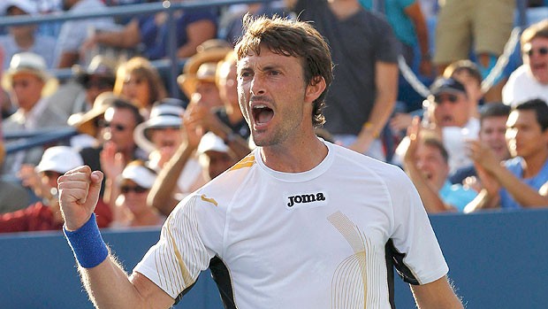 Juan Carlos Ferrero comemora vitória sobre Monfils no US Open (Foto: Reuters)