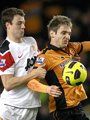 Kevin Doyle Jonny Evans Manchester United x Wolverhampton Wanderers (Foto: Reuters)