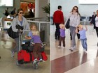Fernanda Lima circula em aeroporto com os filhos gêmeos
