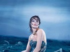 Milla Jovovich posa 'sem roupa' para calendário