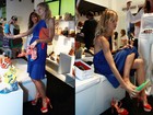 Karolina Kurkova experimenta sapatos em loja do Rio