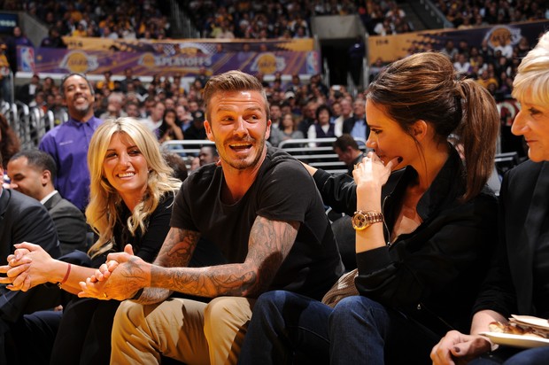 David e Victoria Beckham vão a jogo de basquete juntos (Foto: Getty Images)
