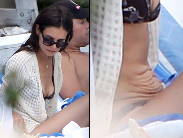 9) No ano passado, durante um dia de piscina em Miami, Katie Holmes assustou com uma barriga bem flácida e enrugada