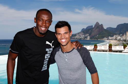 Usain Bolt e Taylor Lautner (Foto: Reprodução/Facebook)