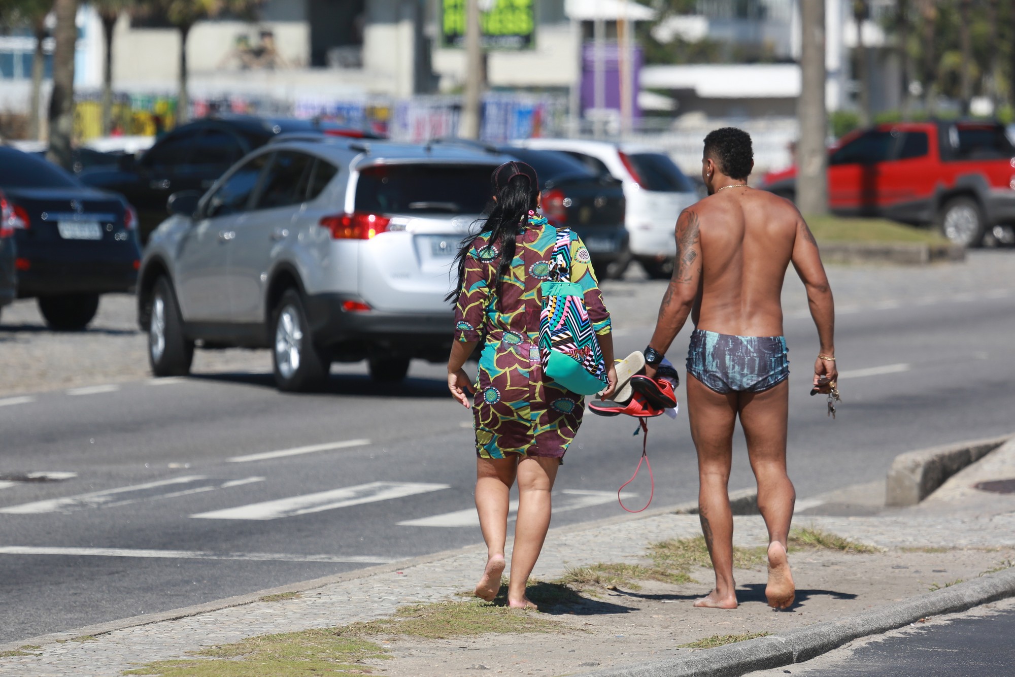 Naldo e Mulher Moranguinho em dia de folga na praia da Barra da Tijuca