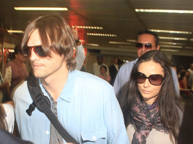 Ashton Kutcher e Demi Moore desembarcam em São Paulo