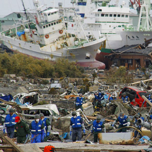 Equipes de resgate buscam vítimas em Matsushima, Miyagi (Foto: AP Photo/Kyodo News)