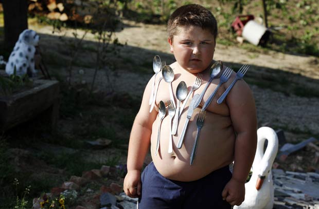 Segundo pais, menino também teria poderes de cura. (Foto: Nikola Solic/Reuters)