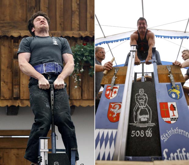 Participantes tentam levantar um peso de 250 quilos. (Foto: Michael Dalder/Reuters)