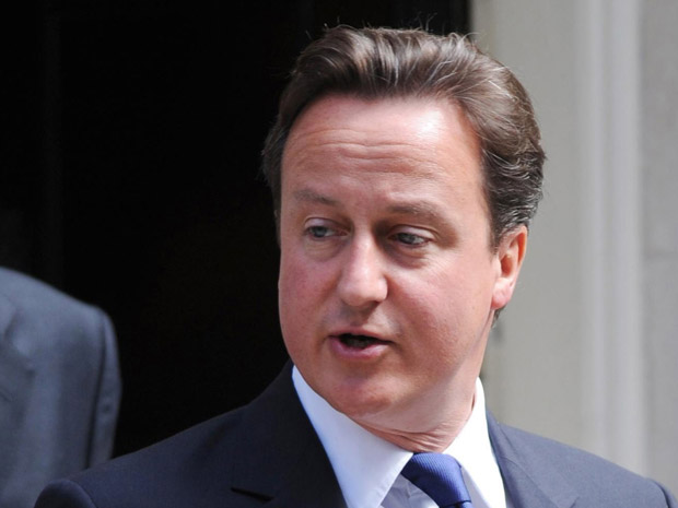 O premiê britânico, David Cameron, deixa a residência oficial nesta quarta-feira (6) (Foto: AP)