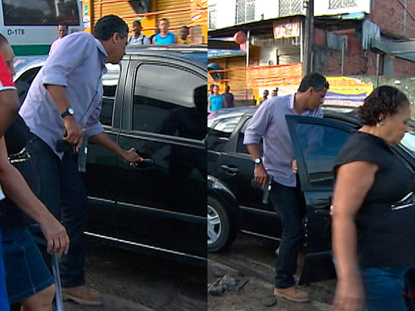 Homem mostra arma em manifestação no bairro de Águas Claras (Foto: Reprodução/TV Bahia)