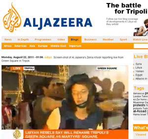 Repórter da Al-Jazeera é vista na Praça Verde (Foto: Reprodução/Al-Jazeera)