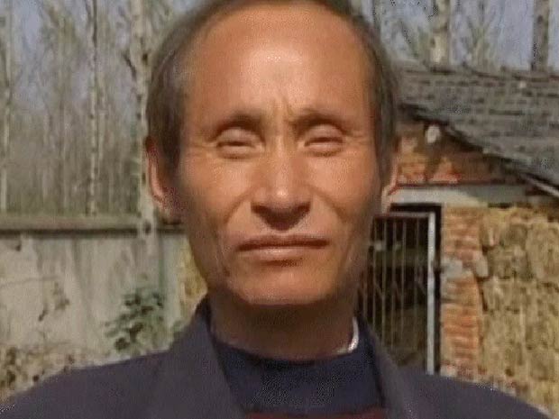 O agricultor Luo Yuanping (Foto: BBC)