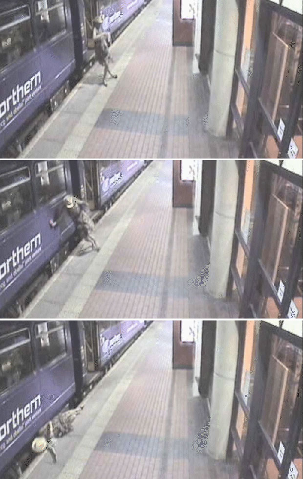 Mulher foi filmada tropeçando e pondo em risco a própria vida (Foto: British Transport Police/BBC)