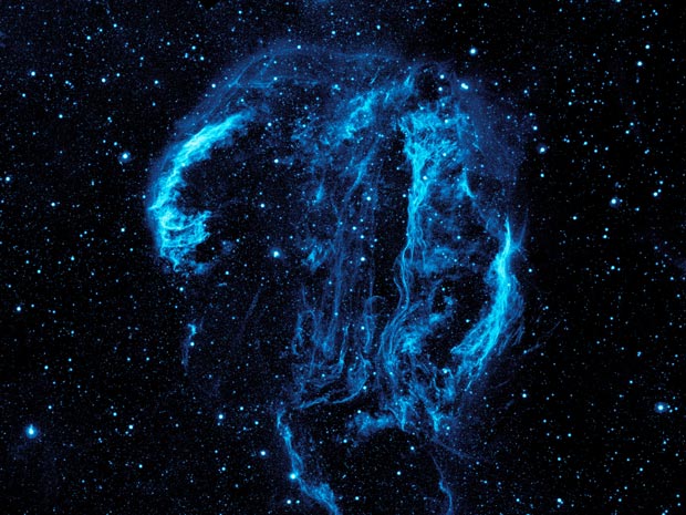 Nebulosa criada pela mistura de gases e poeira tem efeito de luz ultravioleta  (Foto: AFP/Nasa)