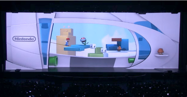 O telão de apresentação se transforma em uma imensa tela de videogame (Foto: Reprodução)