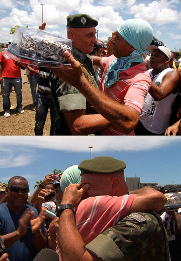 Abraço entre manifestante e militar durante um protesto no Brasil (Foto: Reprodução)