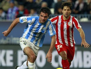 Diego, meia do Atlético de Madri, contra o Málaga (Foto: EFE)