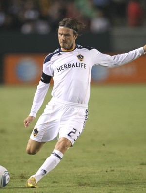 Beckham em ação pelo Galaxy contra o Colorado Rapids (Foto: Getty Images)