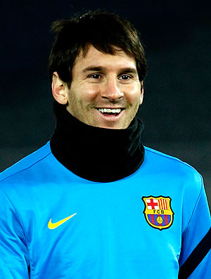 Messi no treino do Barcelona no Japão (Foto: AP)