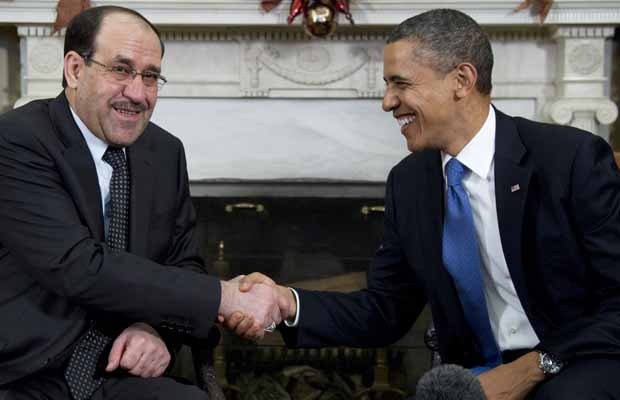 O premiê do Iraque, Nuri al Maliki, e o presidente dos EUA, Barack Obama, durante encontro nesta segunda-feira (12) na Casa Branca (Foto: AP)